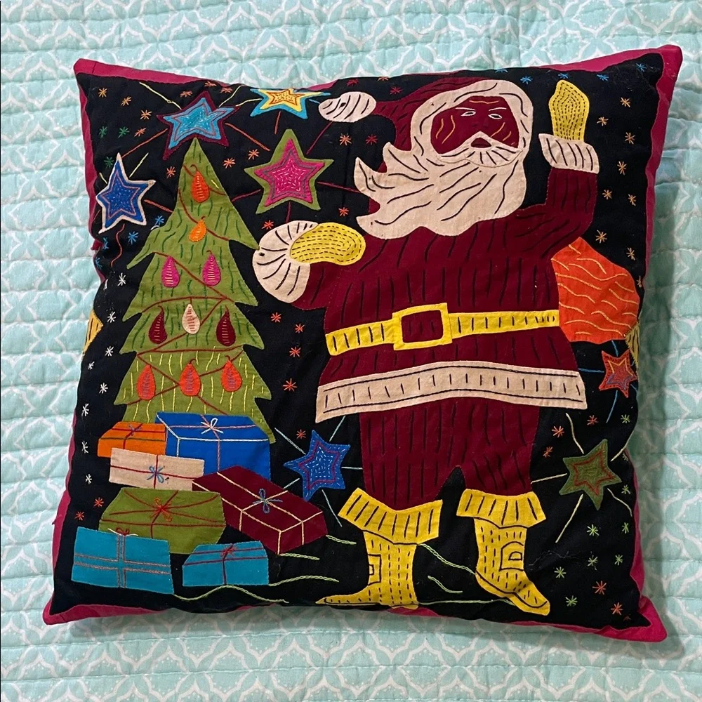 Santa Claus at the Christmas tree mola pillow